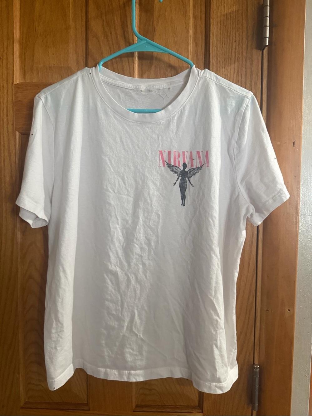 NIRVANA White Tee with Pink Logo and Black Angel Graphic